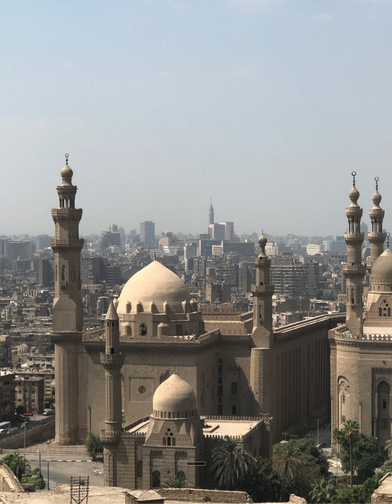 Sacred Cairo skyline with mosque domes and minarets