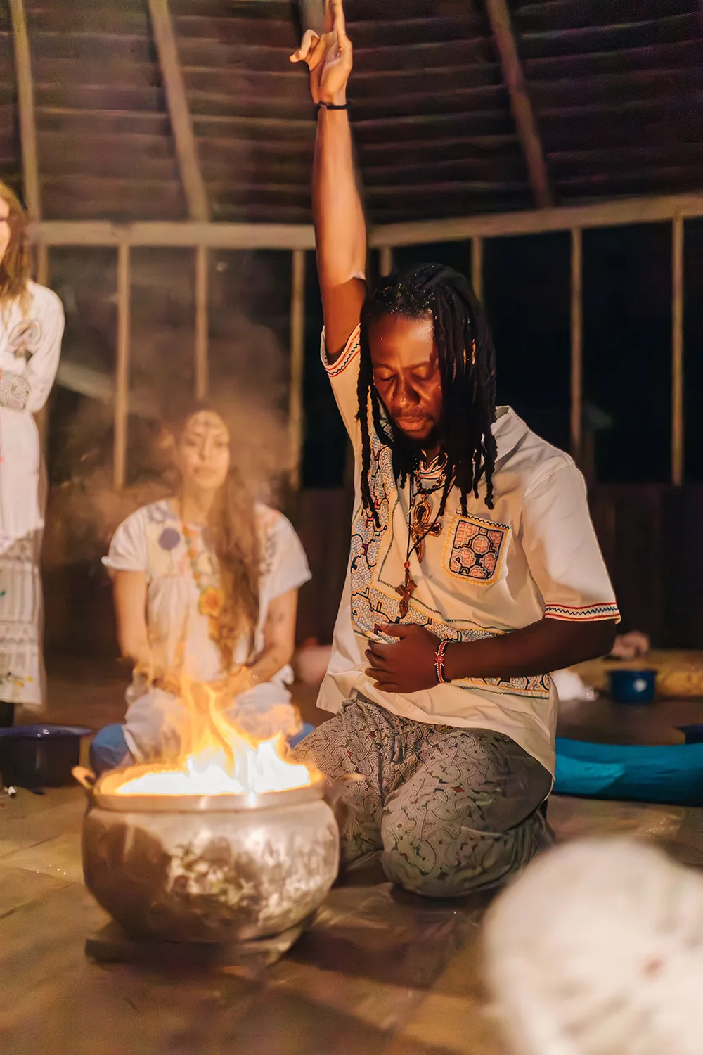 Sacred fire ceremony inside an Amazonian maloca